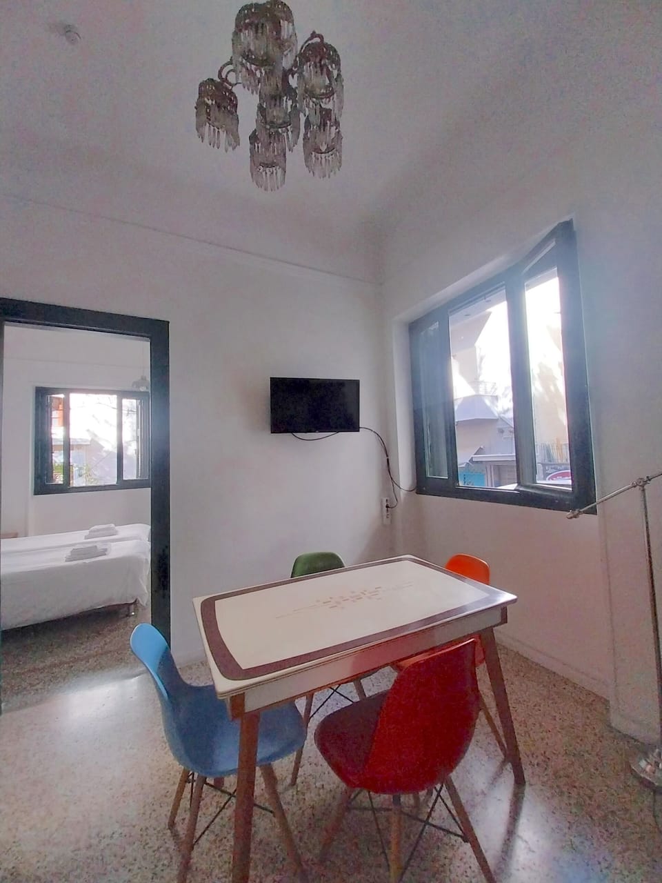 EP9G - Mezzanine floor apartment dining with Smart TV