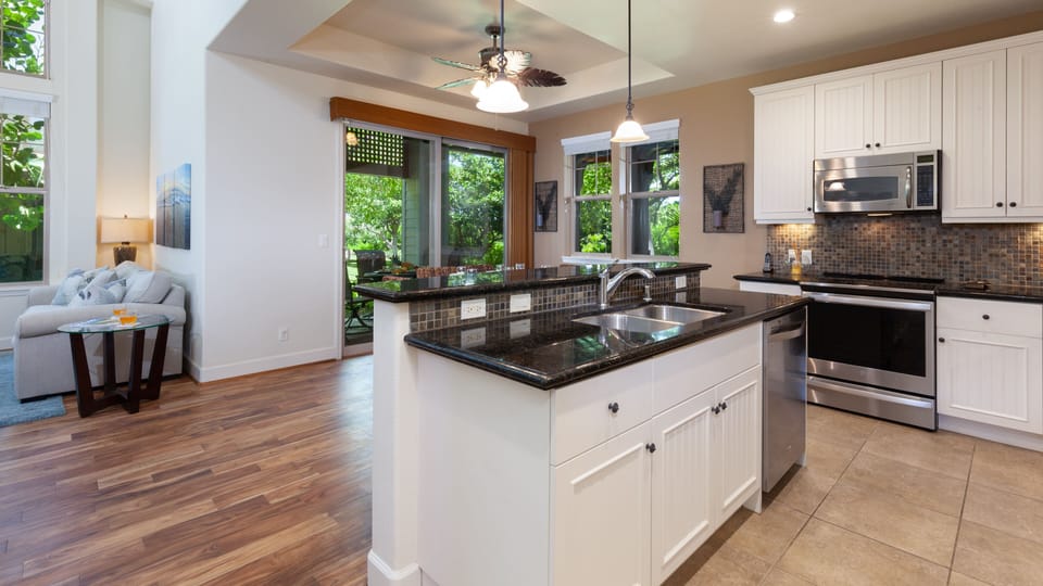 Enjoy cooking delicious island inspired meals in the open concept kitchen