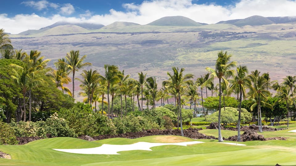 View of the Mauna Lani Golf Course and mountains beyond