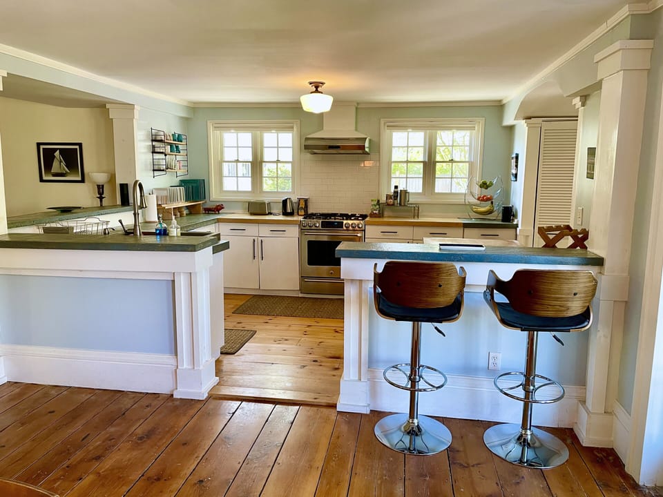 Renovated open concept kitchen. Open to dining room & 2 living rooms.