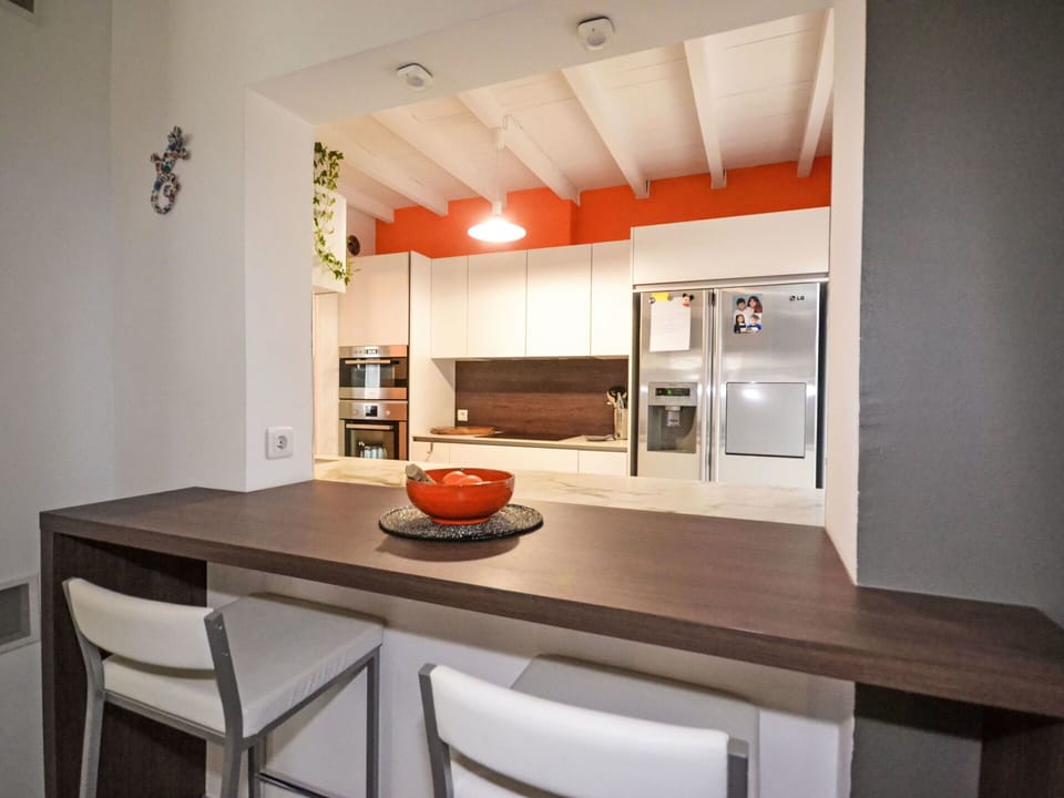 Furniture, Interior Design, Kitchen, Wall, Flooring, Countertop, Wood, Ceiling, Cabinetry, Light Fixture