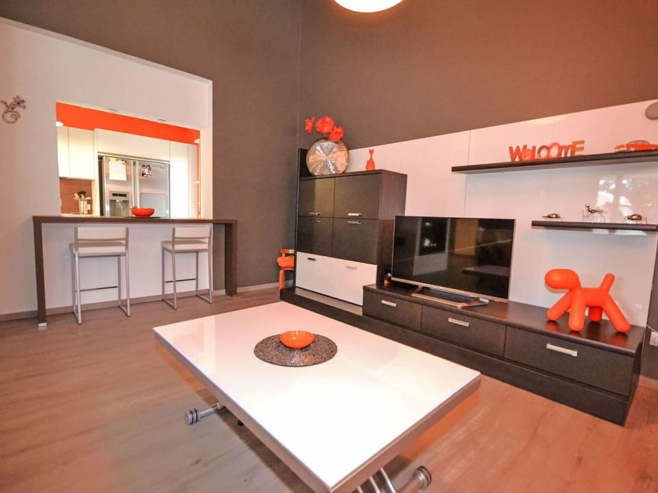 Furniture, Interior Design, Wall, Flooring, Wood, Floor, Table, Lighting, Ceiling, Living Room