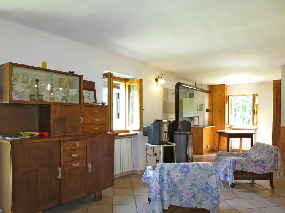 Property, Furniture, Cabinetry, Table, Picture Frame, Building, Drawer, Chair, Wood, Lighting