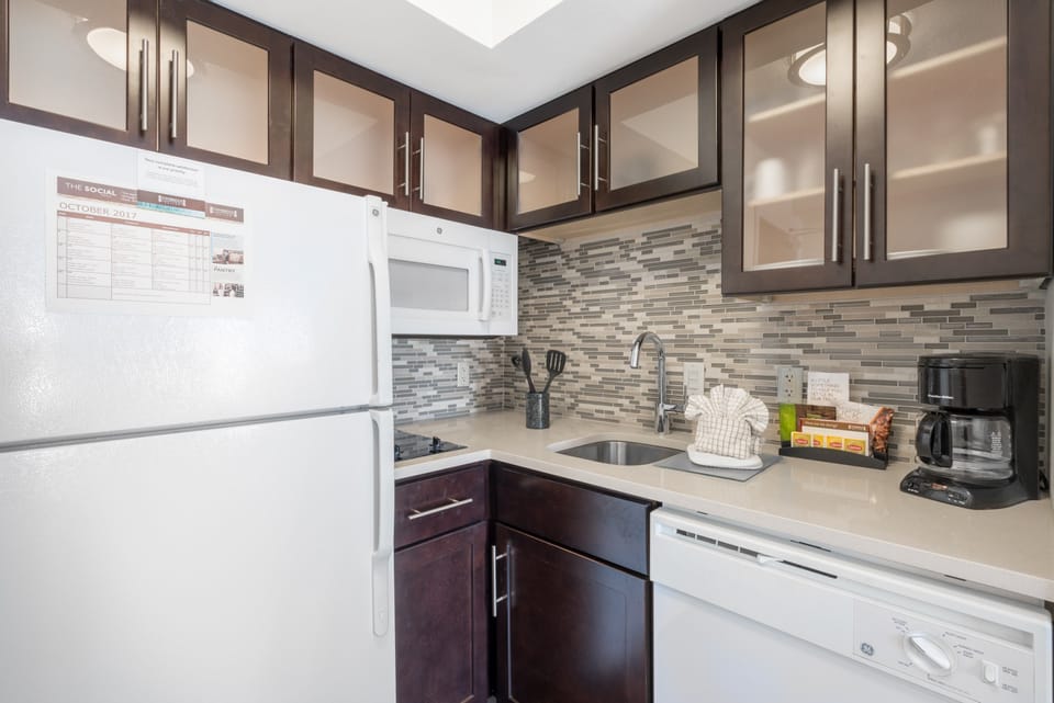 Curb your appetite by cooking a meal in your kitchen.