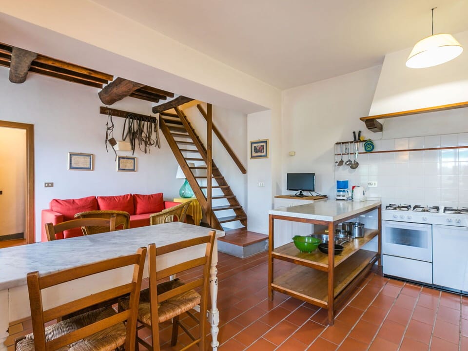 Property, Furniture, Table, Living Room, Couch, Wood, Cabinetry, Flooring, Picture Frame, Kitchen Appliance