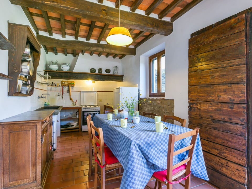 Table, Furniture, Property, Chair, Interior Design, Window, Wood, Cabinetry, Houseplant, Beam