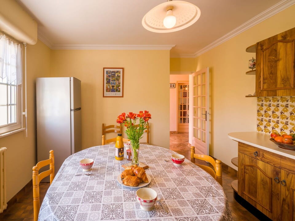 Furniture, Cabinetry, Flower, Table, Property, Window, Countertop, Lighting, Chair, Plant