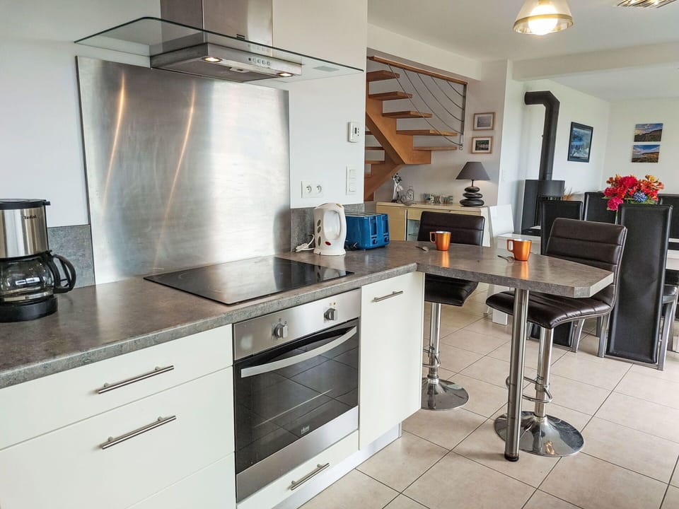 Furniture, Kitchen, Countertop, Flooring, Cabinetry, Kitchen Appliance, Interior Design, Floor, Major Appliance, Wood