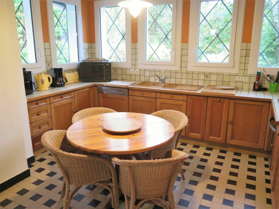 Furniture, Table, Property, Window, Cabinetry, Wood, Chair, Kitchen, Interior Design, Lighting