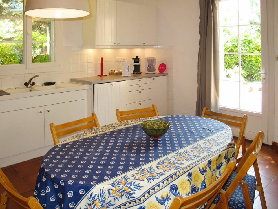 Furniture, Tap, Property, Kitchen Sink, Cabinetry, Sink, Countertop, Window, Azure, Table