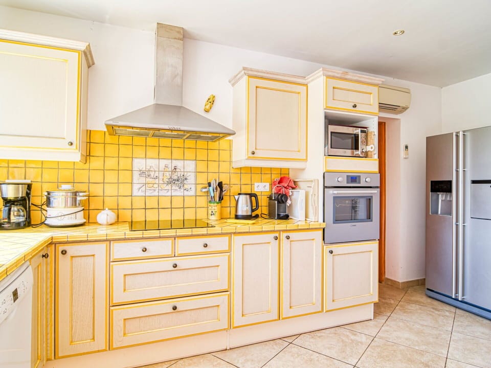 Cabinetry, Countertop, Property, Furniture, Sink, Kitchen Appliance, Kitchen, Building, Kitchen Stove, Wood