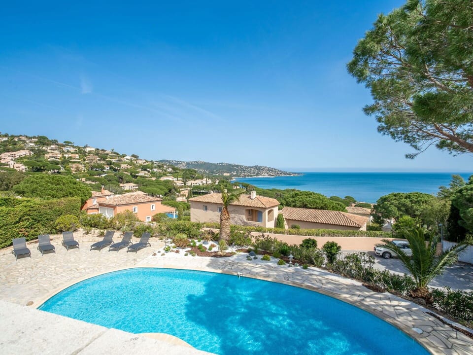 Sky, Water, Property, Plant, Seaside Resort, Azure, Swimming Pool, Tree, Coastal And Oceanic Landforms, Leisure