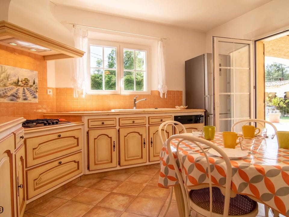 Furniture, Cabinetry, Sink, Countertop, Window, Drawer, Wood, Kitchen, Houseplant, Interior Design