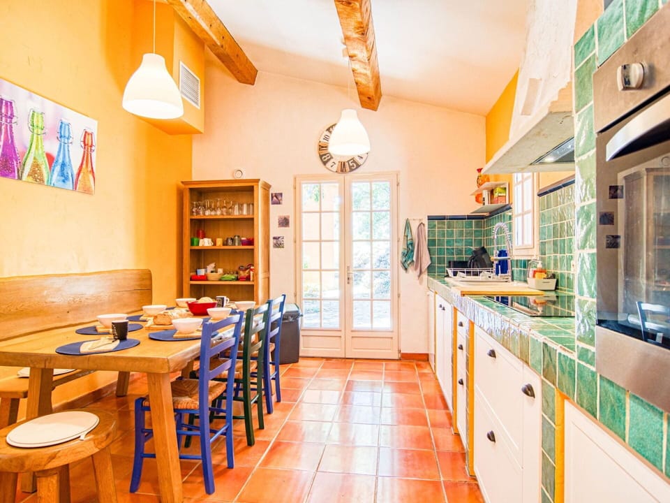Furniture, Property, Cabinetry, Table, Building, Shelf, Chair, Lighting, Shelving, Orange