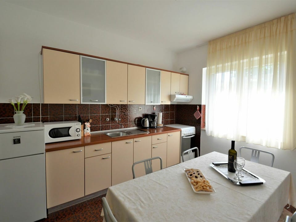 Countertop, Cabinetry, Furniture, Property, Table, Tap, Kitchen Sink, Building, Sink, Wood