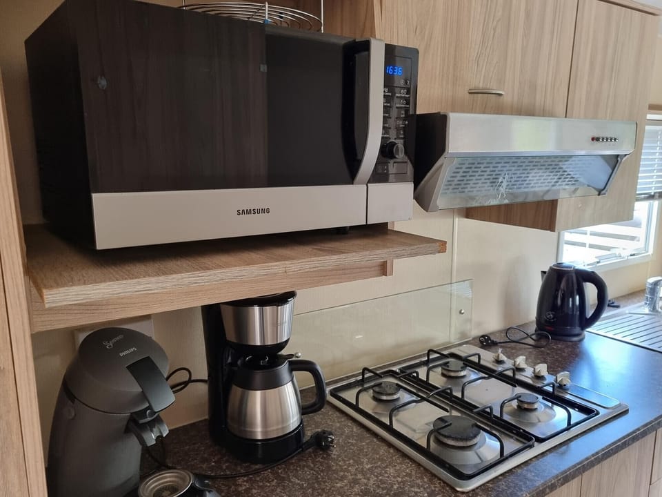 Countertop with microwave oven from RBR 166 - Beach Resort Kamperland