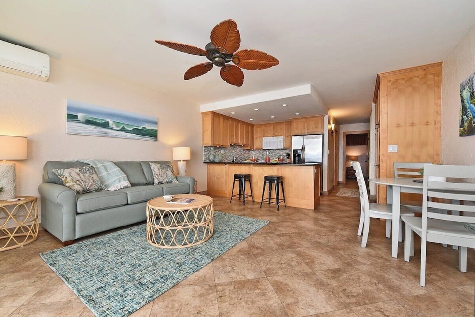 Relax in a cozy living room with island style.