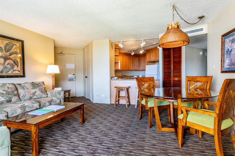 Unwind in your spacious island-inspired retreat with tropical décor, a fully equipped kitchen for your convenience, and a comfortable dining area where you can share meals and make memories together.