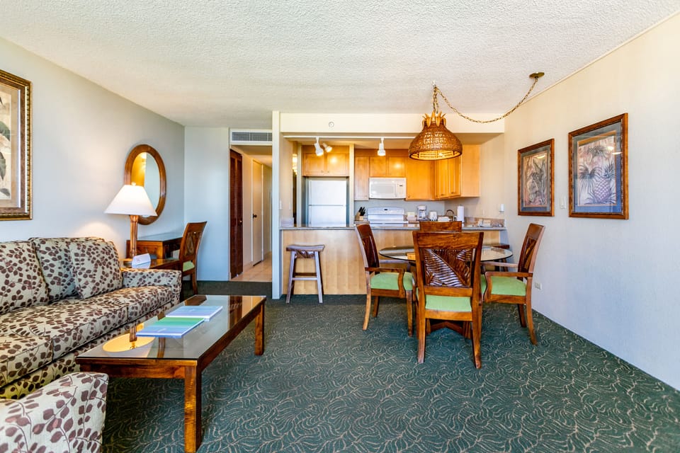 Step into your open-plan retreat where living, dining, and kitchen spaces blend seamlessly. Relax on cozy furnishings and enjoy the bright, welcoming atmosphere perfect for unwinding after a day of adventure.