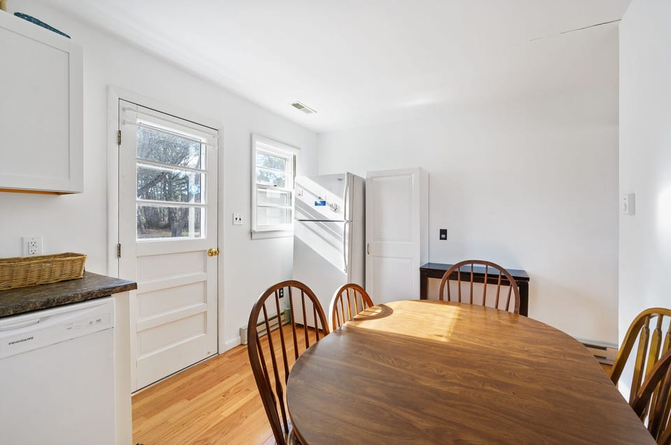 The sunny Eat-in Kitchen has all the comforts of home.