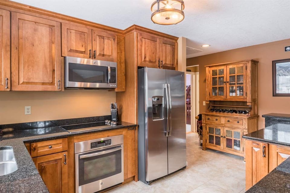 The kitchen also offers stainless steel appliances, a drip coffee maker.