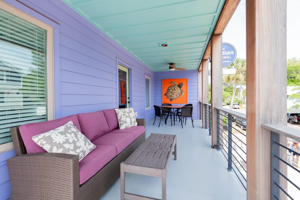 Lounge Seating and 4 person dining area on private balcony.