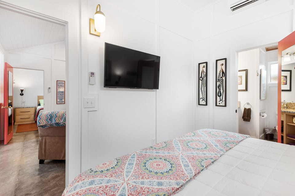 This bedroom has a King size bed and flat screen TV.