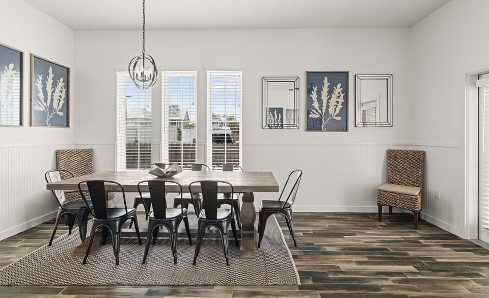 Dining Area — Rustic Wood Table for 8, Black Metal Chairs, Orb Chandelier & Blue Coral Art
