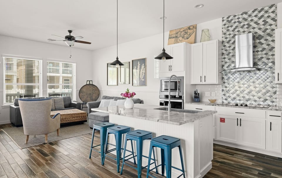 Kitchen & Living — White Island, Marble Counter, Teal Stools, Scallop Tile Backsplash & Black Pendants