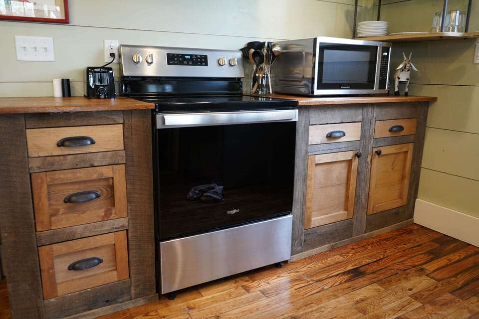 Dishwasher, range, 4-slice toaster, microwave, and two refrigerators available
