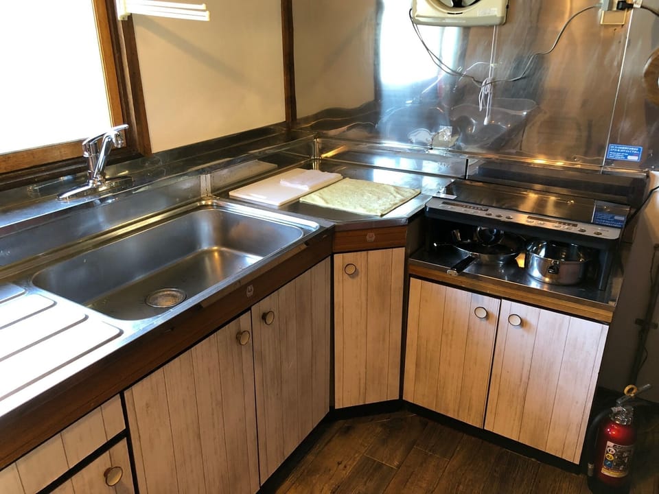 Fully equipped kitchen space. It is old but beautiful.