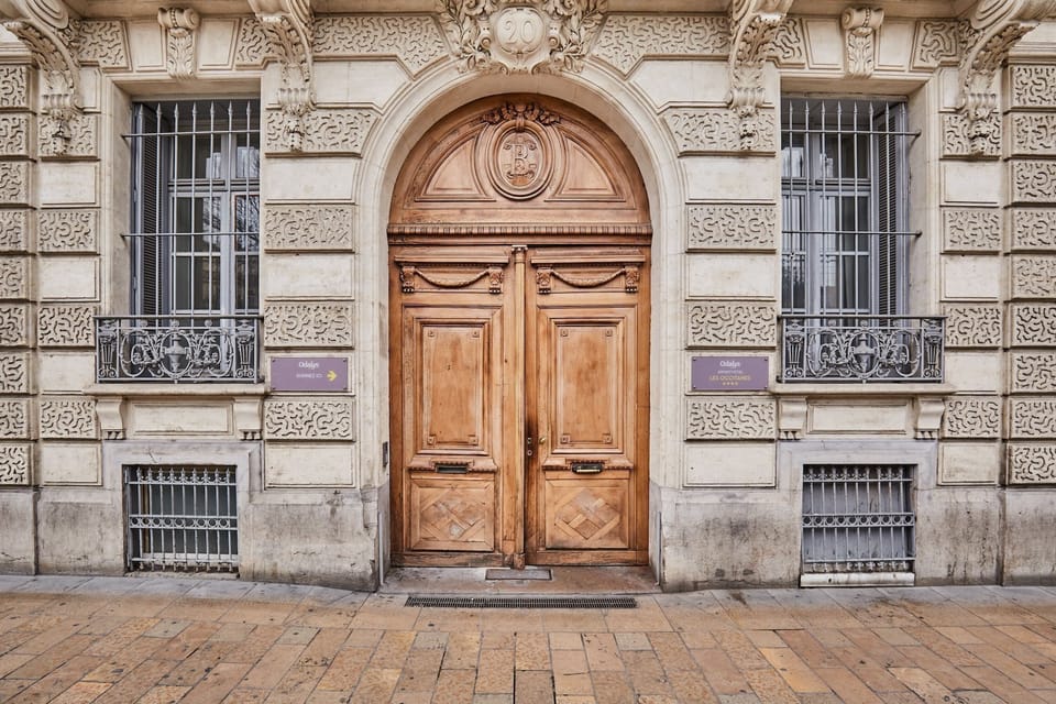 Historic stonework and a stunning entryway welcome guests into a place full of character.