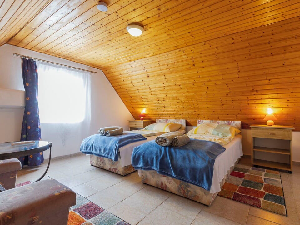 Wood, Furniture, Home, Ceiling, Resort, Chair, Hotel, Light Fixture, Wood Flooring, Bed