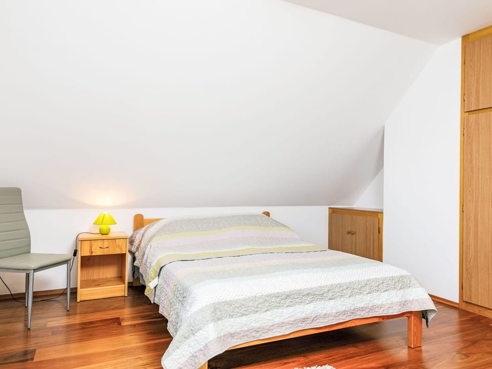 Flooring, Interior Design, Floor, Bed, Wood Flooring, Wood, Bedroom, Furniture, Ceiling, Room
