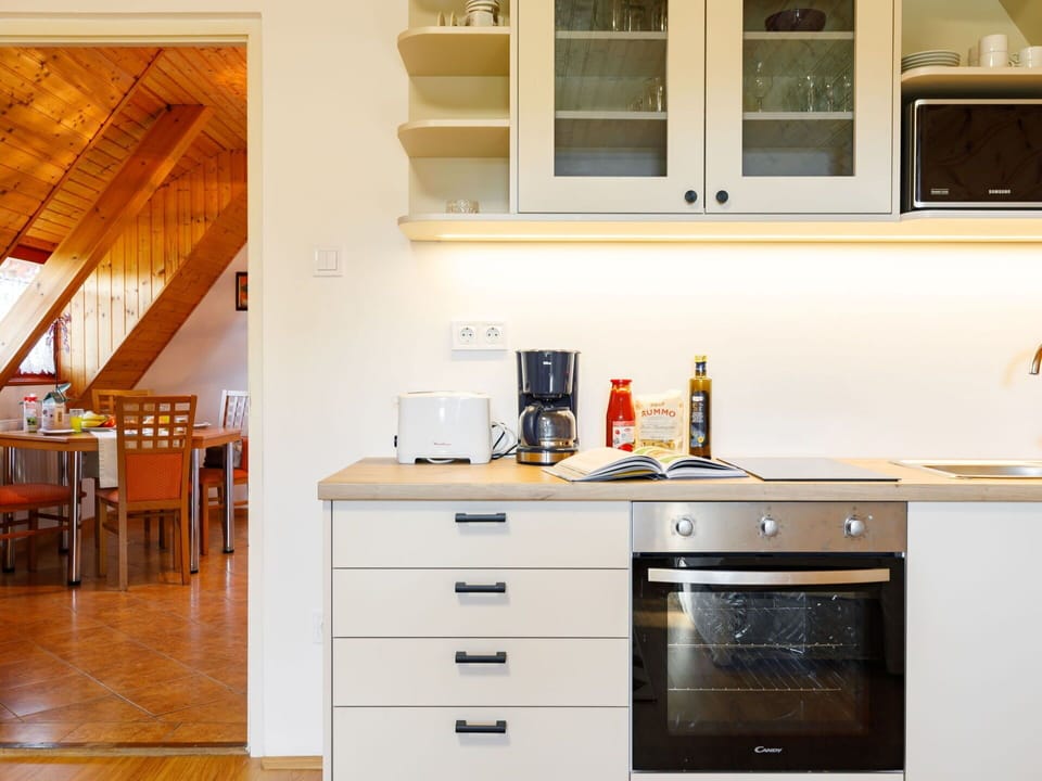 Cabinetry, Furniture, Property, Countertop, Kitchen, Building, Drawer, Window, Kitchen Stove, Wood