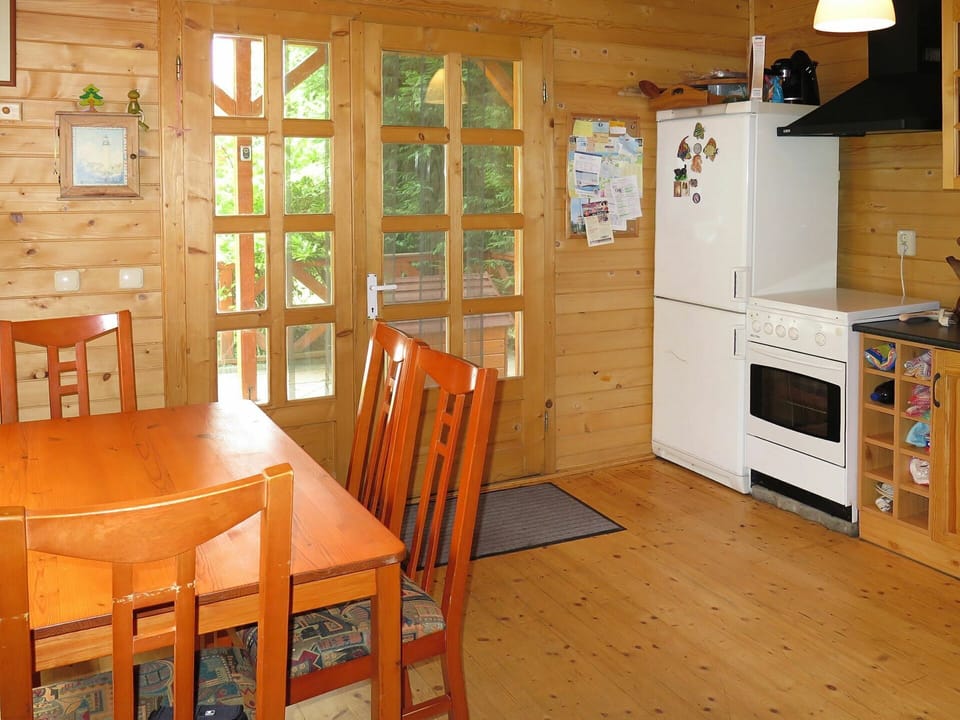 Furniture, Cabinetry, Table, Wood, Lighting, Chair, Flooring, Interior Design, Countertop, Wood Stain