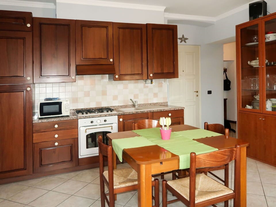 Cabinetry, Furniture, Countertop, Property, White, Wood, Kitchen, Interior Design, Home Appliance, Lighting