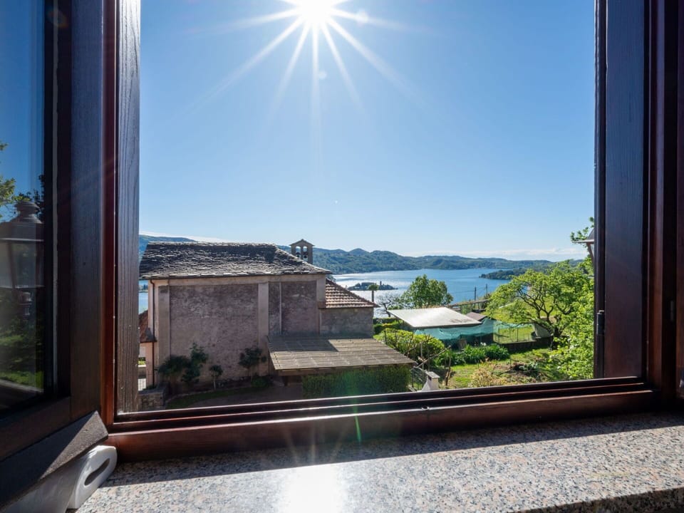 Sky, Plant, Window, Water, Building, Light, Azure, Wood, Shade, Interior Design