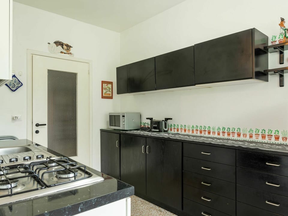 Cabinetry, Countertop, Property, White, Dresser, Drawer, Gas Stove, Kitchen, Interior Design, Wood
