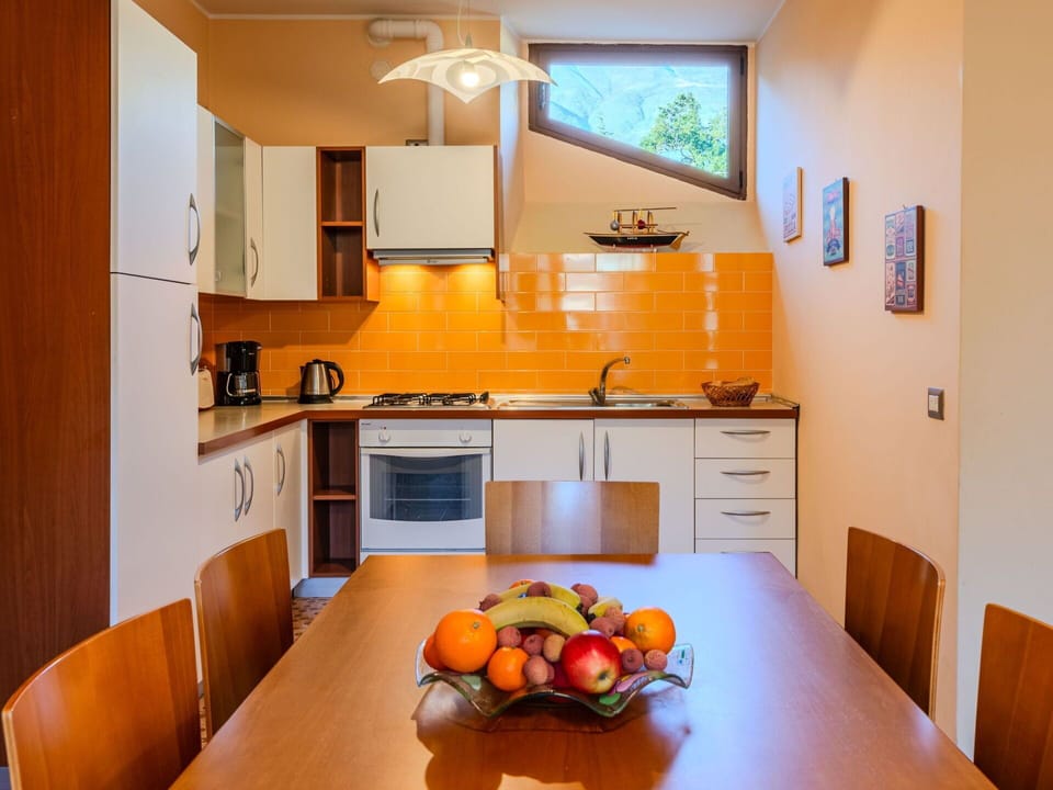 Table, Furniture, Cabinetry, Countertop, Property, Sink, Kitchen Sink, Tap, Kitchen, Orange