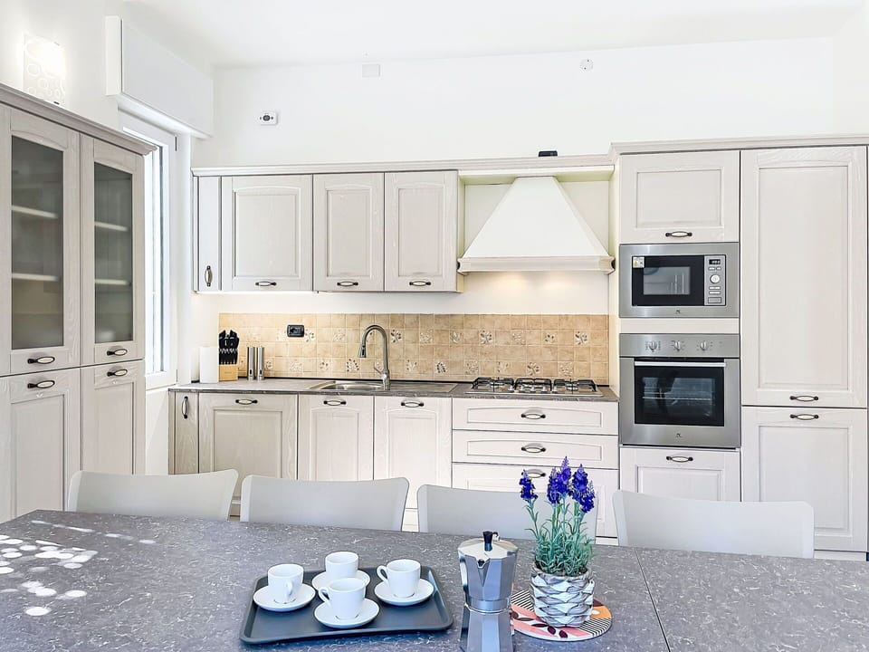 Kitchen, Kitchen Appliance, Furniture, Interior Design, Cabinetry, Countertop, Wood, Major Appliance, Flooring, Ceiling