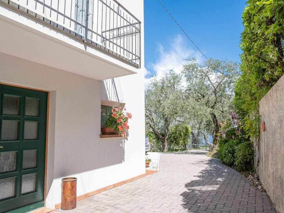 Sky, Plant, Cloud, Building, Road Surface, Shade, Urban Design, Real Estate, Facade, Residential Area