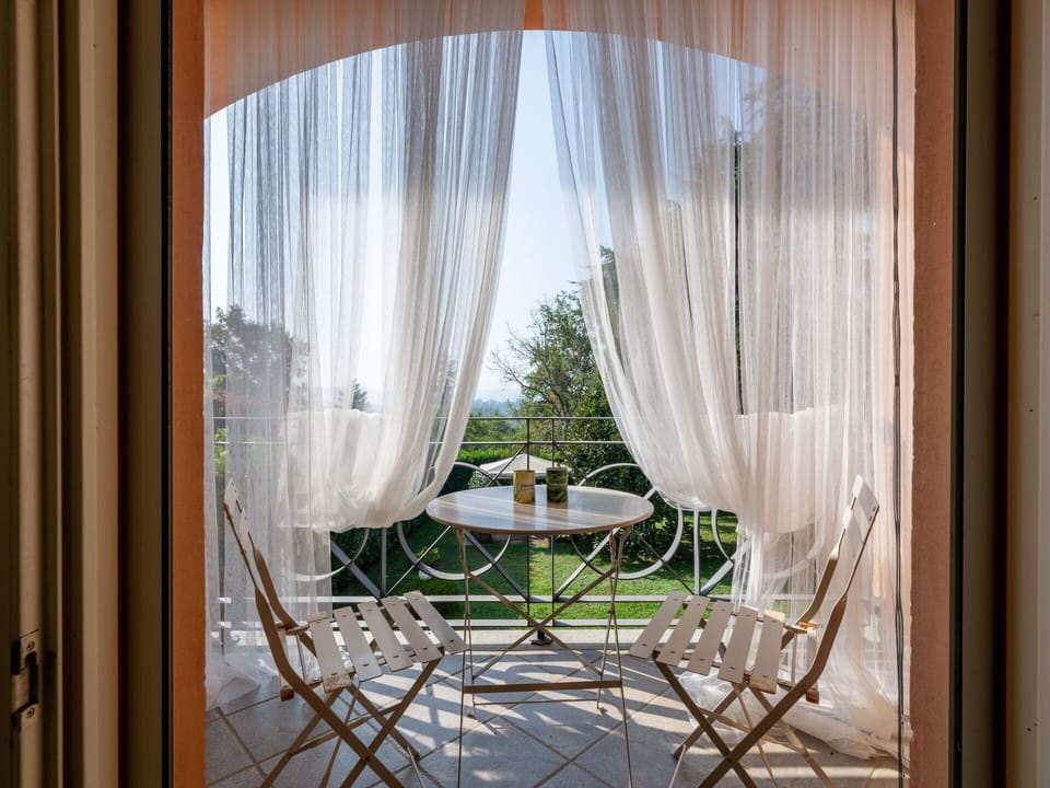Interior Design, Furniture, Textile, Curtain, Window Covering, Lighting, Window Treatment, Chair, Shade, Room