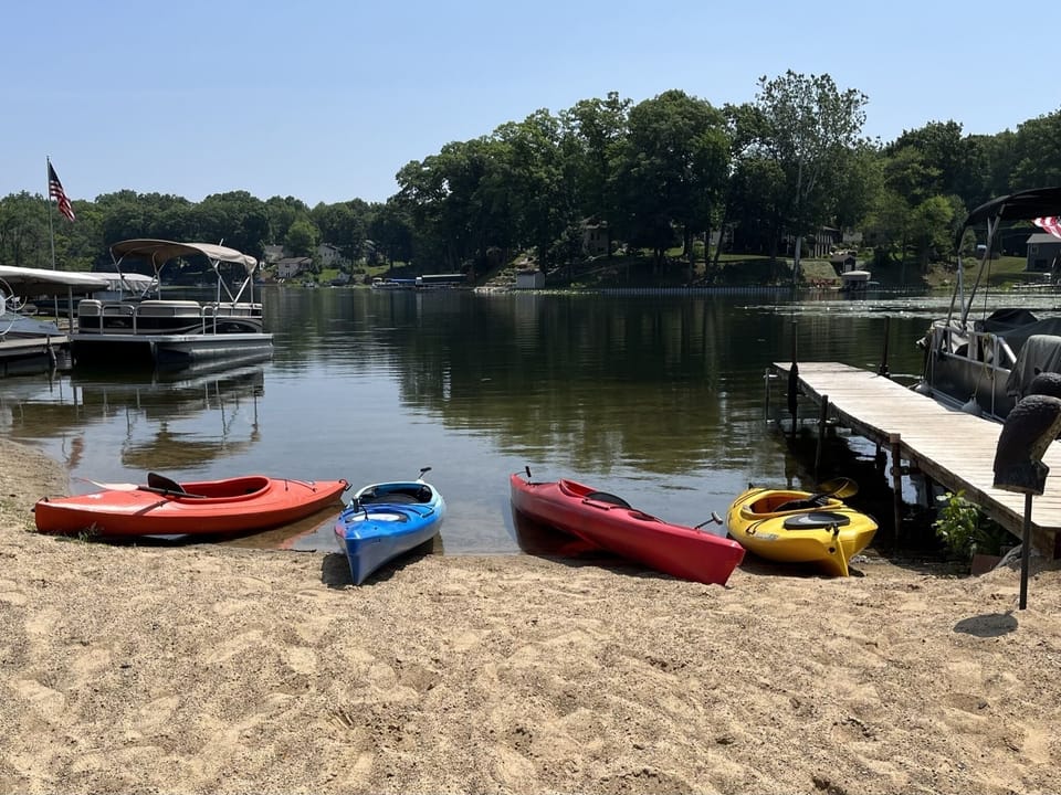 Kayaks ready for fun on the sandy beach 