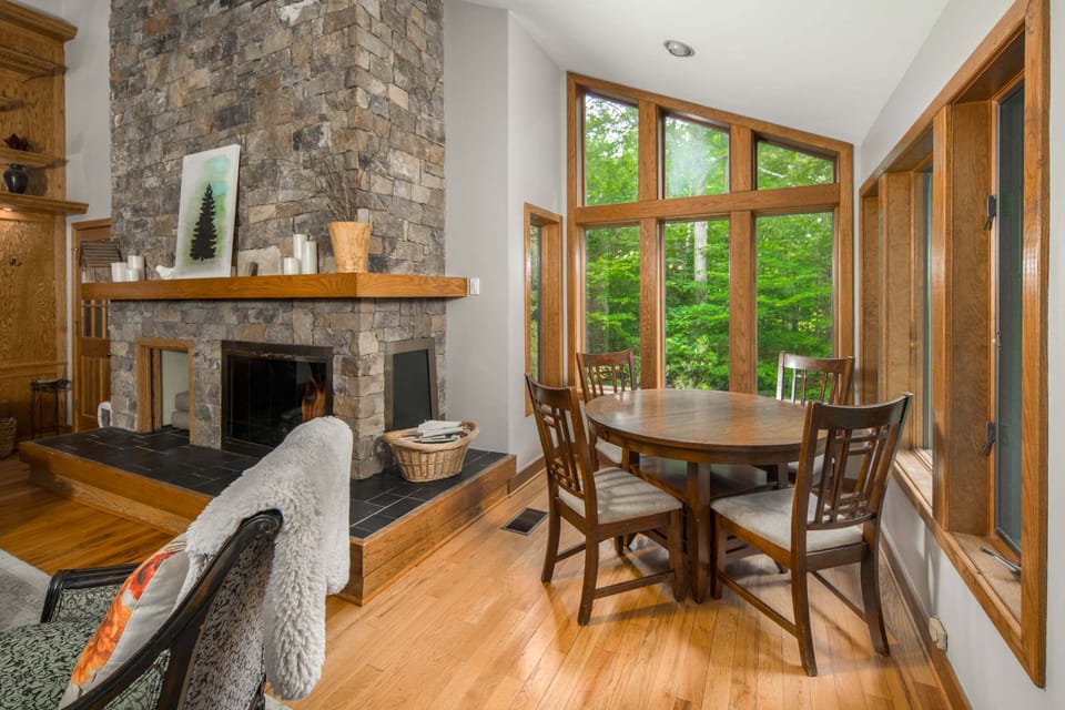 Breakfast table with seating for four and views of the backyard