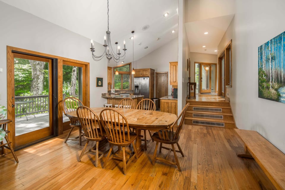 Bright dining room with easy access to the deck and kitchen