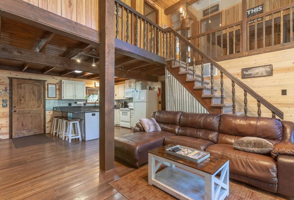 The open-concept living area feels cozy in this beautiful cabin.