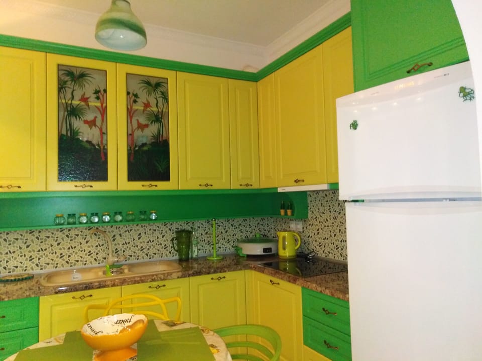 the kitchen and the refrigerator