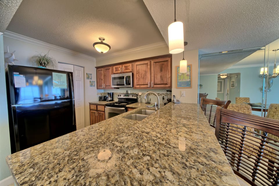 Kitchen with granite and standard appliances