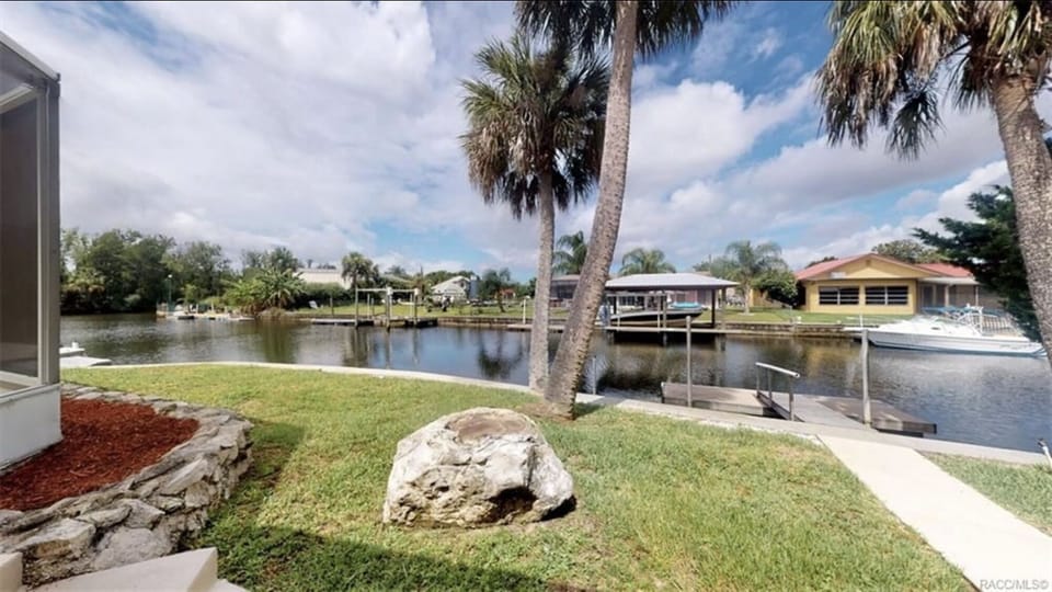 Back Of House On Deep Canal